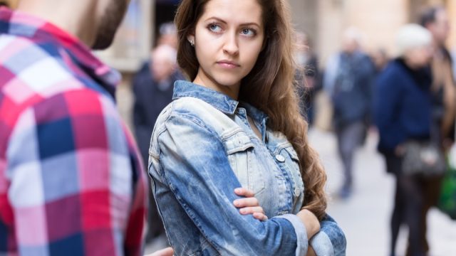 Woman Angrily Crossing Arms