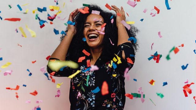 young woman celebrating