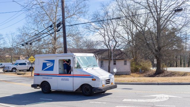 United States Postal Service van delivering mail in Buford, Georgia