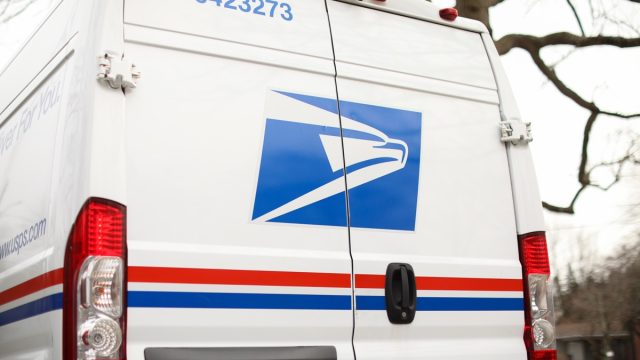united states postal service mail box and truck for mail delivery