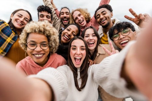 Diverse group of friends taking a selfie