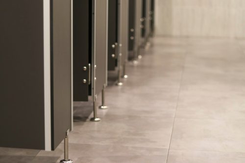 Public toilets that are partitioned into rooms.