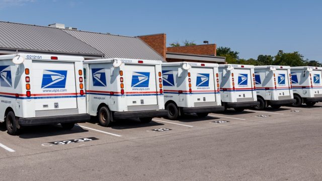 USPS Post Office Mail Trucks parked