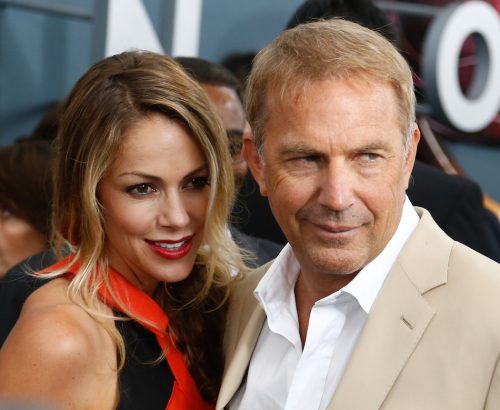 Christine Baumgartner and Kevin Costner at the premiere of "Man of Steel" in 2013