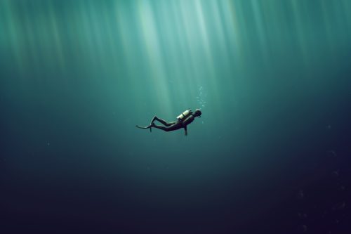 deep sea diver in the ocean