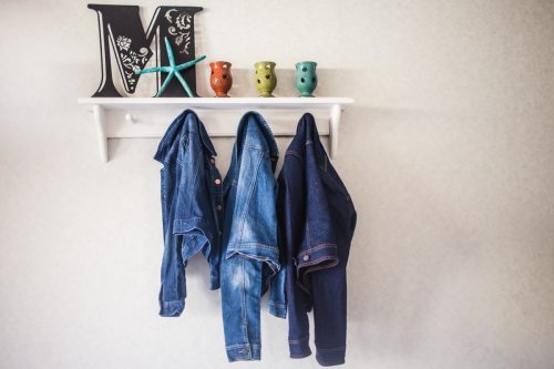 entryway shelf with jacjets hanging