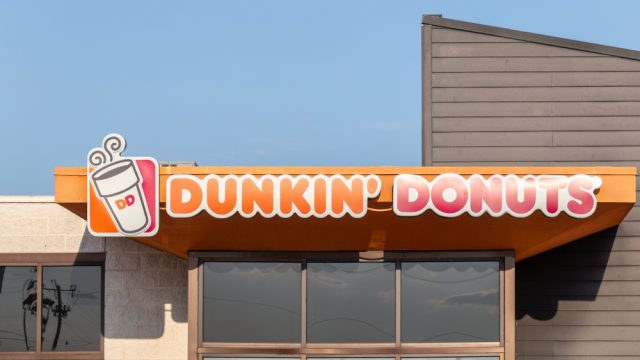 The exterior sign of a Dunkin' Donuts location
