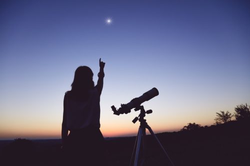 stargazing pointing at night sky