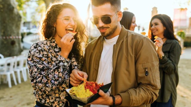 Friends Enjoying Street Food