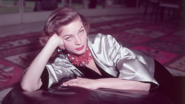 Lauren Bacall posing for a portrait in 1955