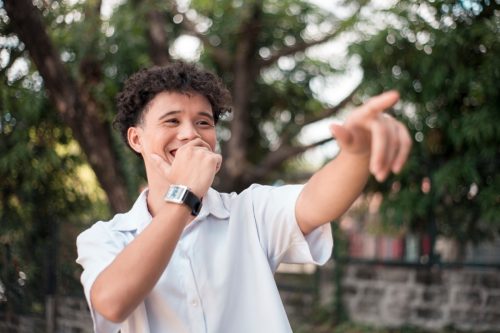 pointing and laughing at someone
