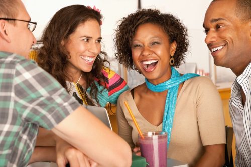 group of friends talking and laughing