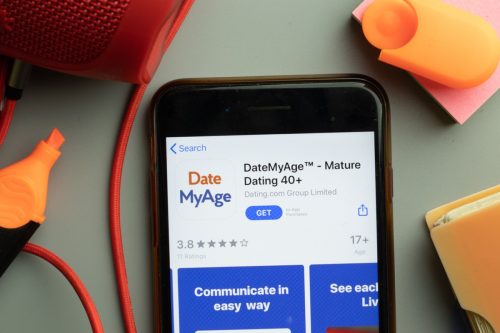 Close-up of the Date My Age app open on a phone