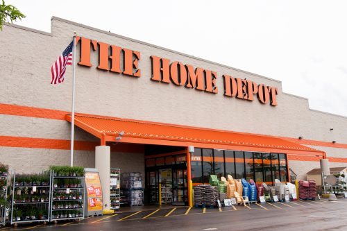 A home depot storefront with chairs and other items for sale