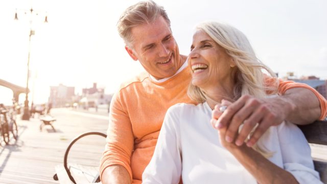 Man and woman on a date, sitting outside