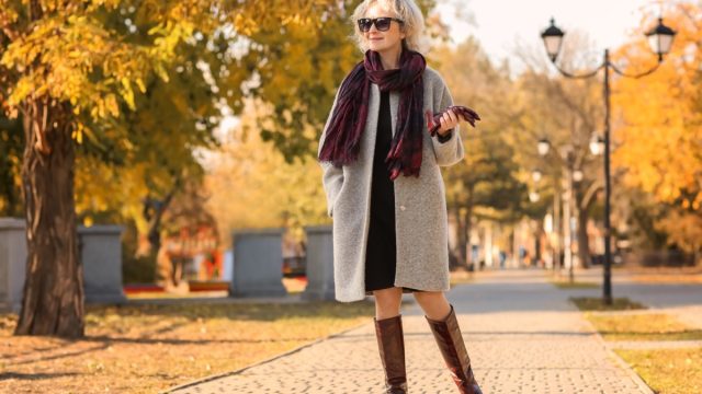 mature woman in the park during autumn