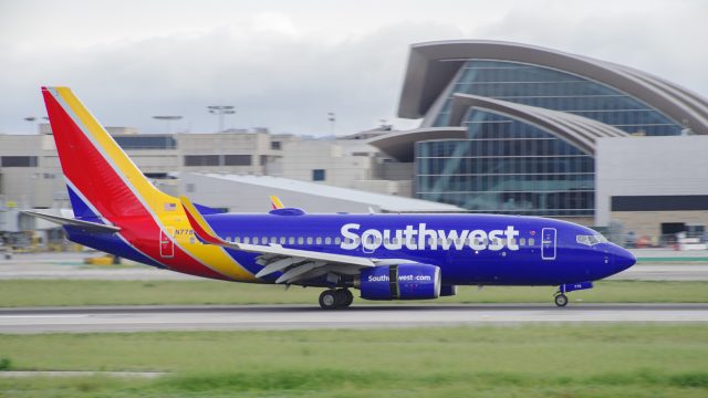 A Southwest Airlines plane landing at an airport