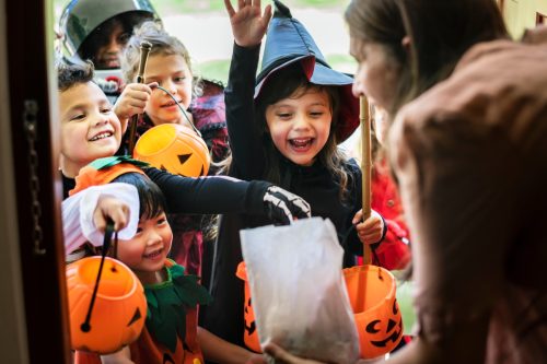 group of trick or treaters during halloween