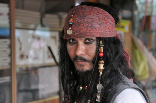 man dressed as captain jack sparrow