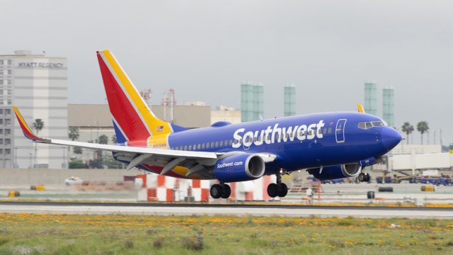 LOS ANGELES INTERNATIONAL AIRPORT, CA/USA - MARCH 7, 2018: Southwest Airlines jet shown landing at LAX.