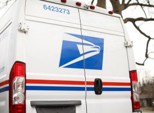 united states postal service mail box and truck for mail delivery