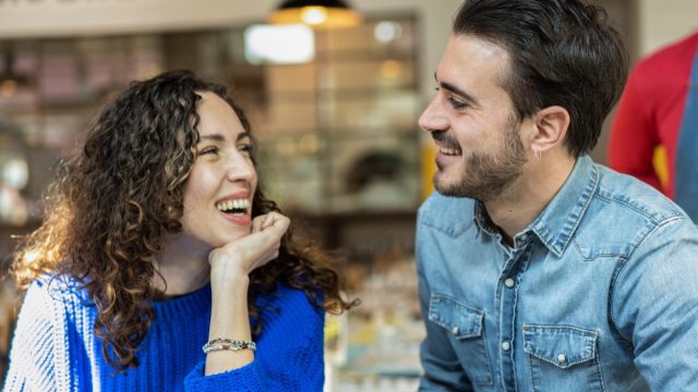 Two People Laughing on the First Date