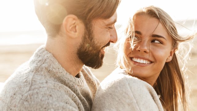 man and woman embracing as he shares love messages for her