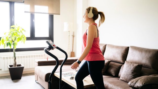 woman happy working out at home