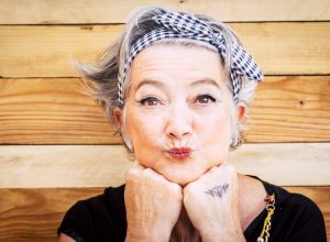 Older Woman with Black and White Headband