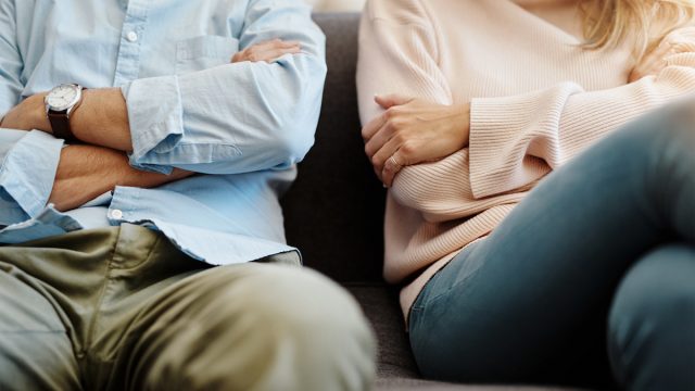 Cropped shot of a couple having a disagreement at home