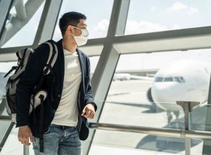 masked man at airport