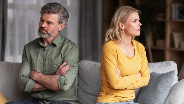 Unhappy middle aged couple fighting or getting a divorce