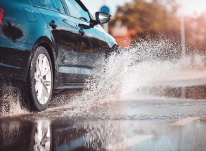 car driving in the rain