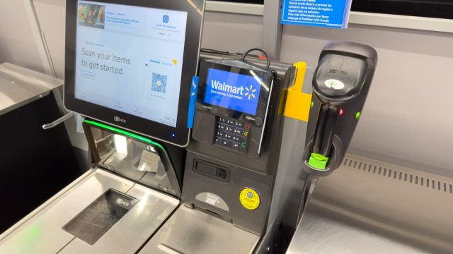 A close up of a Walmart self checkout counter
