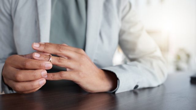Person Removing Their Wedding Ring
