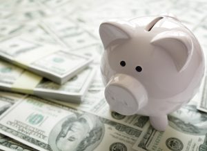 Piggy bank on money concept for business finance, investment, saving or retirement fund