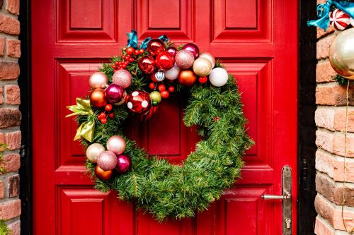 Red Wooden Front Door Decorated with Wreath,