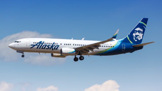 alaska airlines plane in the air