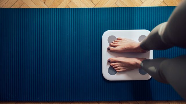 woman on the scale at home