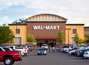 Citrus Heights, California, USA - May 20, 2011: View at a California Walmart storefront from its parking lot. Walmart is an American public multinational corporation that runs chains of large discount department stores and warehouse stores.