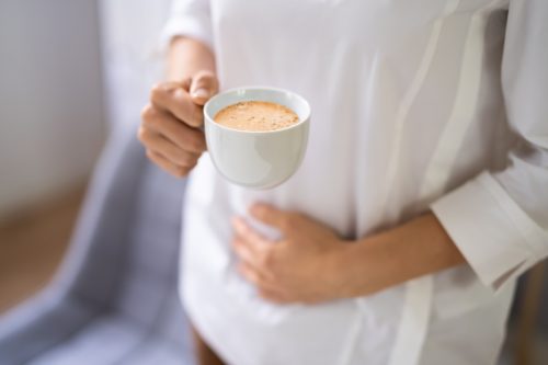 Stomach Ache And Pain From Coffee. Digestive Heartburn