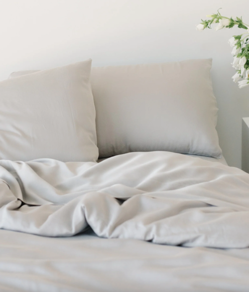 Close up of Cozy Earth sheets on bed