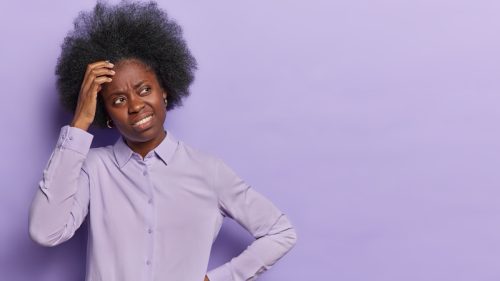 woman looking embarrassed over dirty knock knock jokes