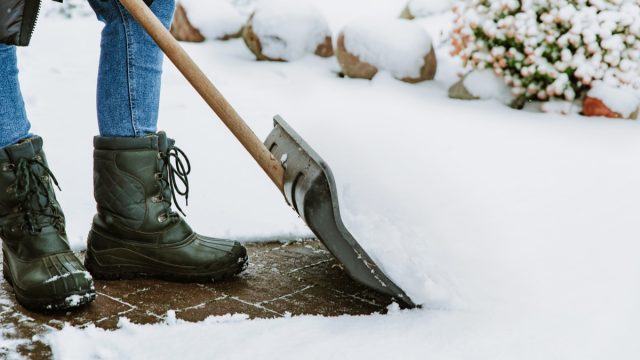 person shoveling snow