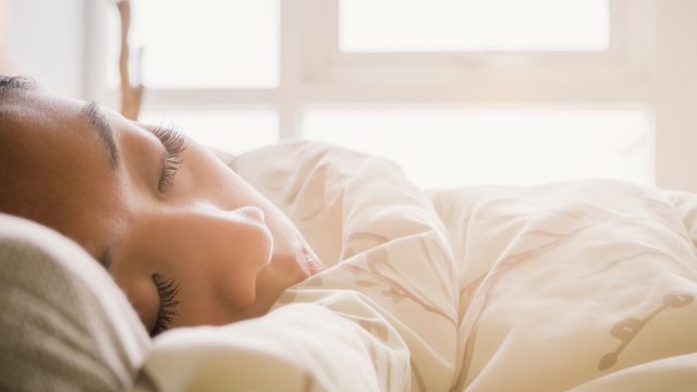 woman sleeping in bed