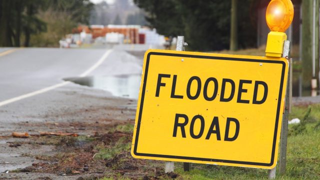 flooded road sign