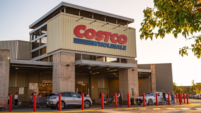 Entrance to a Costco store on a sunny day