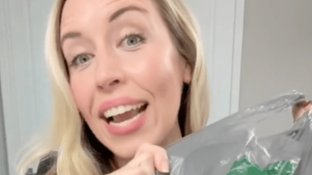 Dermatologist Maren Locke holds up a skincare product from Dollar Tree