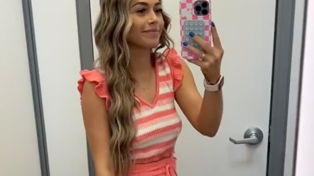 Female shopper trying on spring and summer clothing at Walmart