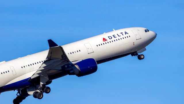 A close up of a Delta Air Lines Airbus A330 taking off.